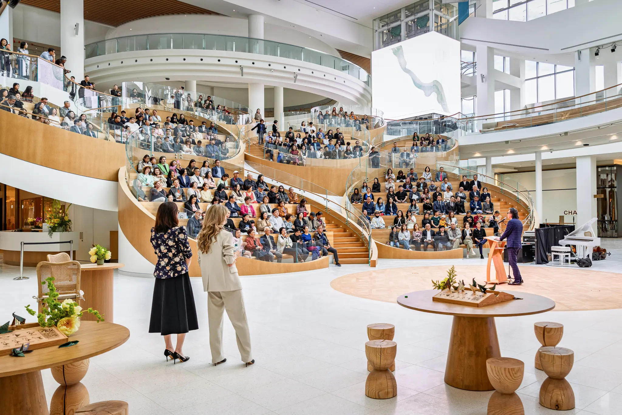 Guests attend Oakridge Park’s grand opening event in the South Atrium in Vancouver.